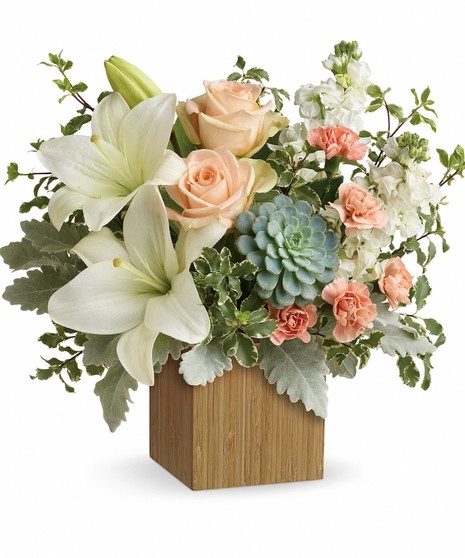 Succulents, peach roses, white asiatic lilies, peach miniature carnations, white stock, along with accent foliage